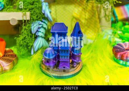 3D printer machine printing plastic model of castle Stock Photo