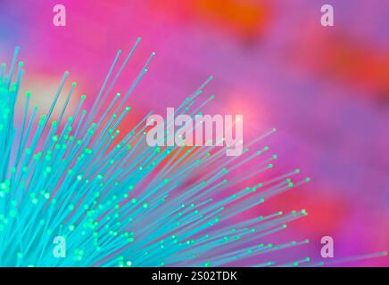 optical fibres dinamic flying from deep on technology background Stock Photo