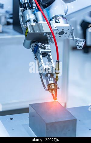 Robotic Welding Machine in a Metal Manufacturing Plant Stock Photo