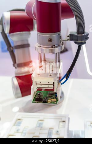 automtic robotic arm system in intellegence pcb factory Stock Photo