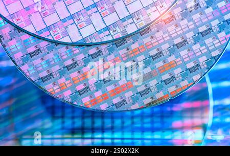 Multi Colored Iridescent Silicon Computer Wafer Close-up View. Stock Photo