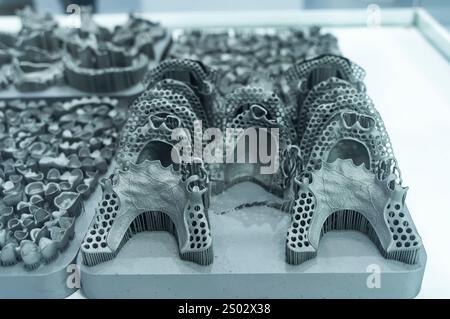 Tooth dental crowns created on 3d printer for metal Stock Photo