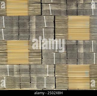 Stacked brown corrugated cardboard boxes flattened boxes Stock Photo