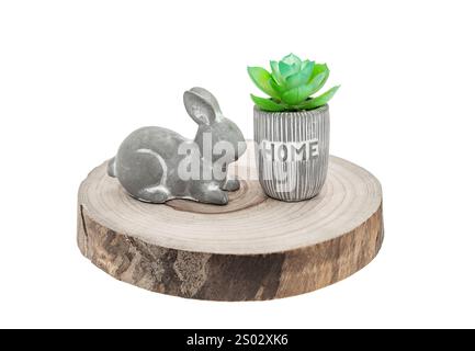 cute cement rabbit statue for decorate on round wood textured background isolated on white Stock Photo