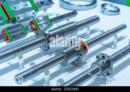 lead screw parts of the CNC machine. The hi-precision part of CNC machine manufacturing process. Stock Photo