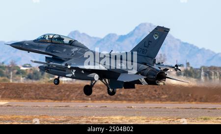 An F-16D Fighting Falcon part of the 310th Fighter Squadron takes off, Dec. 15, 2020, at Luke Air Force Base, Arizona. Luke AFB graduates more than 18 Stock Photo