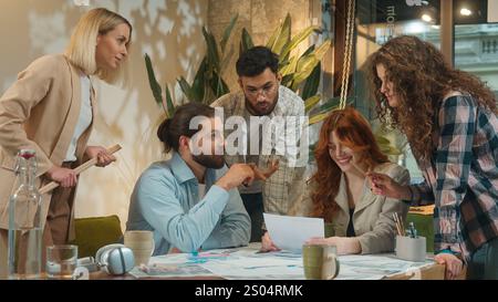 Business team creative freelance group coworkers architects partners students men women girls guys male female study talk discuss corporate startup Stock Photo