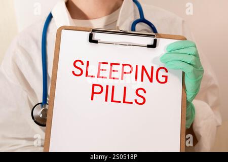 SLEEPING PILLS text on a letterhead in a medical folder on a beautiful background Stock Photo