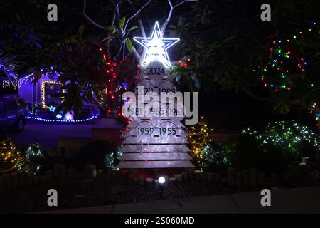 Monterey Park, United States. 24th Dec, 2024. A Christmas display featuring the World Series titles won by the Brooklyn Dodgers (1955) and Los Angeles Dodgers (1959, 1963, 1965, 1981, 1988, 2020 and 2024) at a residence, Tuesday, Dec. 24, 2024, in Monterey Park, Calif. Credit: Image of sport /Alamy Live News Stock Photo