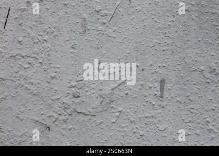Surface of cement wall with uneven old plaster. Stone wall background. Stock Photo