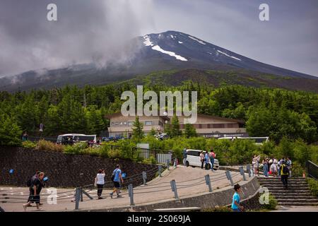 Fuji Hakone-Izu National Park, Japan, Jun 17, 2024: Tourists explore the 5th Station of Mt. Fugi during a cloudy, summer day. The attraction is a popu Stock Photo