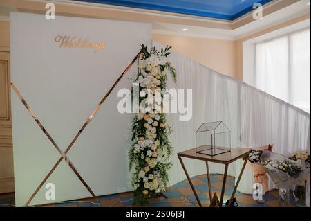Elegant Wedding Reception Setup with Floral Decor. Stock Photo