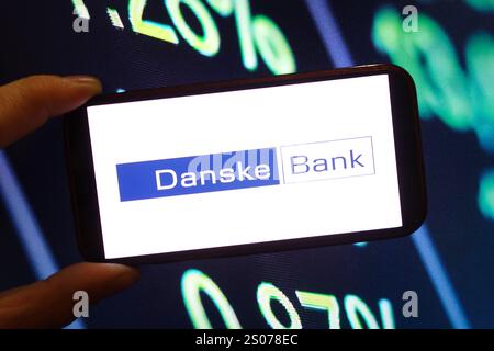 Poland. 25th Dec, 2024. In this photo illustration, the Danske Bank company logo is seen displayed on a smartphone screen. (Photo by Piotr Swat/SOPA Images/Sipa USA) *** Strictly for editorial news purposes only *** Credit: Sipa USA/Alamy Live News Stock Photo