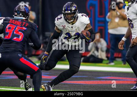 Baltimore Ravens running back Derrick Henry (22) is tackled by Atlanta ...