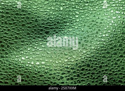 Full frame macro abstract texture background of a green color embossed vinyl fabric background Stock Photo