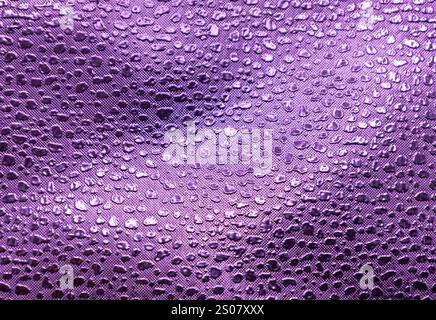 Full frame macro abstract texture background of a purple color embossed vinyl fabric background Stock Photo