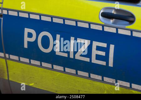 Dirty German Police Car Side View – Grungy Law Enforcement Vehicle Stock Photo