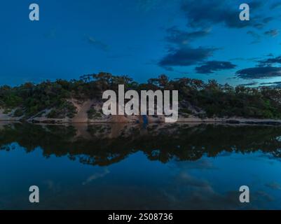 Aerial sunrise over the lagoon and beach at  Wamberal on the Central Coast, NSW, Australia. Stock Photo