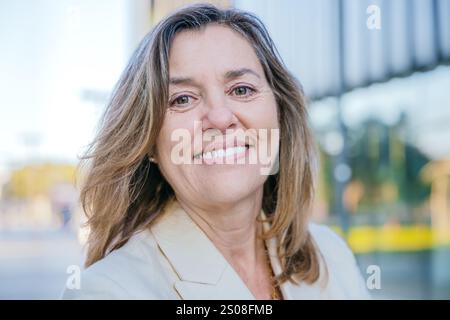 Smiling Mature Woman Portrait Outdoors Stock Photo