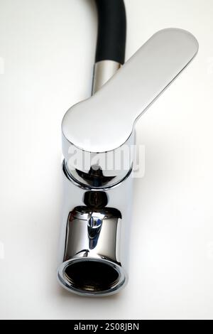 Detail of a Single lever sink mixer black spout chrome saver isolated on white background Stock Photo