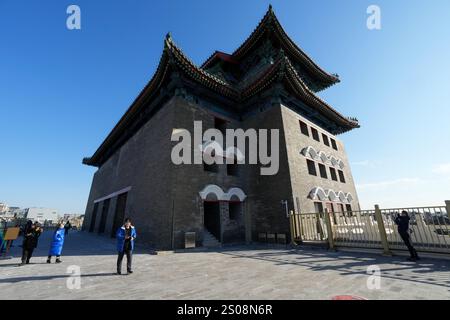 (241226) -- BEIJING, Dec. 26, 2024 (Xinhua) -- People visit the Zhengyangmen Archery Tower in Beijing, capital of China, Dec. 26, 2024. Dating back to the Ming Dynasty (1368-1644), the Zhengyangmen Archery Tower, located along Beijing's central axis, reopened to the public on Thursday. Situated at the southern end of Tian'anmen Square, the Zhengyangmen Gate comprises two structures: the gate tower to the north and the archery tower to the south. The gate highlights the traditional urban management practices of ancient China. During the Ming and Qing Dynasties (1368-1911), the Zhengyangmen Stock Photo