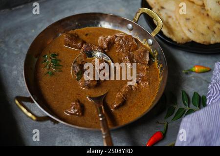 Key Pathal Lamb curry served with Ney Pathal | Kerala breakfast meal Stock Photo ...