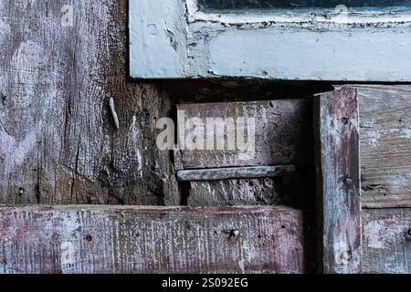 Close-up textured detail of a wall made from pieces of old wood. Nice image for backgrounds Stock Photo