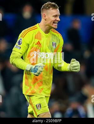 Bernd Leno of Fulham celebrates with Antonee Robinson after winning on ...