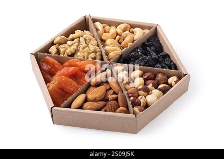 Set of different nuts and dried fruits in cardboard box isolated on white background Stock Photo