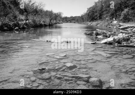 Dinosaur Valley State Park, near Glen Rose, Texas, was created in 1972 to protect dinosaur tracks along the Paluxy River.  It is easy to envision the Stock Photo