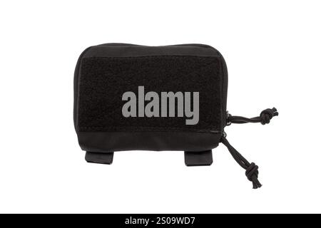 A black zippered case with a Velcro patch on the front, featuring two loops at the bottom and drawstrings on the side, isolated on a white background. Stock Photo