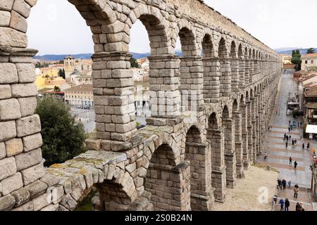 The famous Roman aqueduct in Segovia, Spain, built under emperors Vespasian and Trajan in the first two centuries CE. Stock Photo