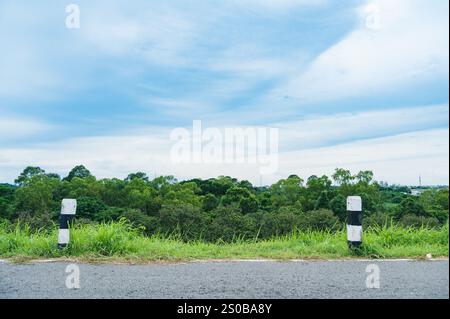 milestone on roadside that telling us how far we walked Stock Photo