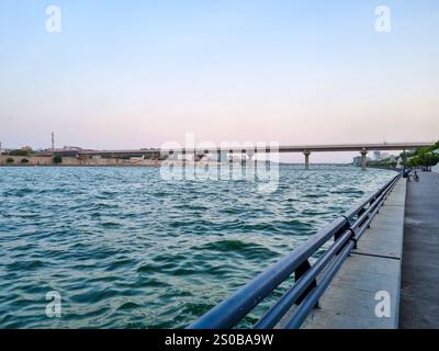 wide angle locked shot of the bridge and Sabarmati river in Ahmedabad at sunset sunrise showing the natural beauty of the city Stock Photo