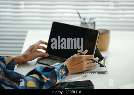 Unrecognizable Woman Using Digital Tablet and Stylus Stock Photo