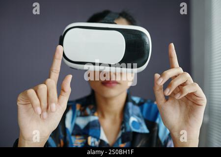 Asian Female Hands Using VR App Stock Photo