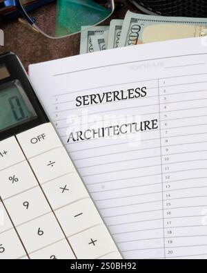 Concept words SERVERLESS ARCHITECTURE it is written in a notebook on a blank page, a vertical photo. Stock Photo