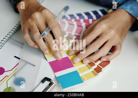 Female Designers Hands Choosing Colors Stock Photo