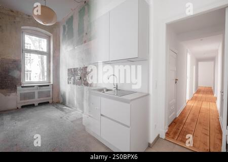 New kitchen before and after renovation - Home Improvement concept Stock Photo