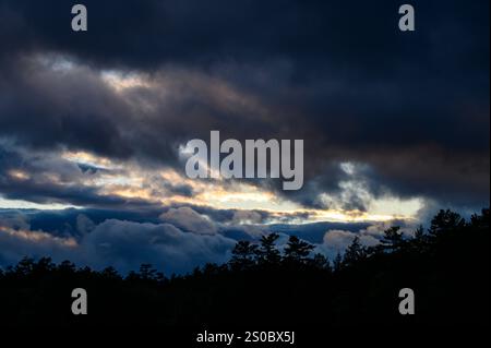 Dark clouds and sunset over Lake Winnipesaukee, New Hampshire. Stock Photo