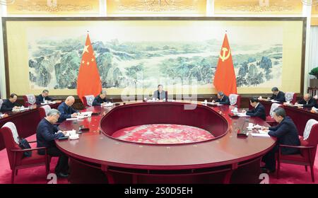 Beijing, China. 27th Dec, 2024. Xi Jinping, general secretary of the Communist Party of China (CPC) Central Committee, delivers an important speech while chairing the criticism and self-criticism meeting of the Political Bureau of the CPC Central Committee. The meeting was held from Thursday to Friday. Credit: Ju Peng/Xinhua/Alamy Live News Stock Photo