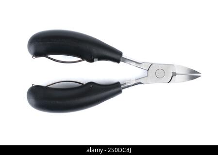 Top view of manicure side cutters on white background. Copy space. Stock Photo
