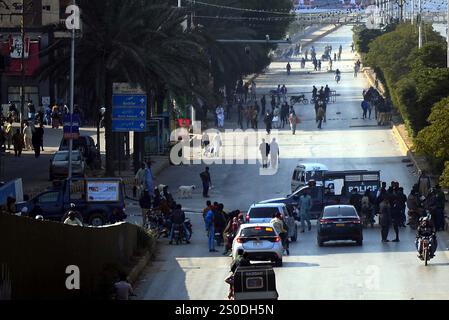 Activists of Majlis Wahdat-e-Muslimeen (MWM) are blocked road as they are holding protest demonstration against unrest situation and prolonged closure of transportation routes in Parachinar district Kurram, at Colony Gate located on Shahrah-e-Faisal in Karachi on Friday, December 27, 2024. Commuters have faced extreme difficulties due to the closure of arterial roads in Karachi due to sit-ins staged by the Majlis Wahdat-e-Muslimeen (MWM) against the tense situation in Parachinar city of Khyber Pakhtunkhwa's Kurram district. Credit: Pakistan Press International (PPI)/Alamy Live News Stock Photo