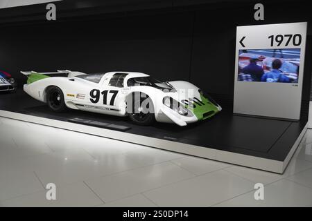 Porsche 917, A Porsche 917 racing car in white with green accents, on display in a museum, Neues Porschemuseum 2009, Stuttgart, Baden-Wuerttemberg, Ge Stock Photo