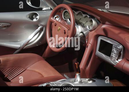 Elegant red interior of a car with leather upholstery and modern dashboard, New Porsche Museum 2009, Stuttgart, Baden-Wuerttemberg, Germany, Europe Stock Photo