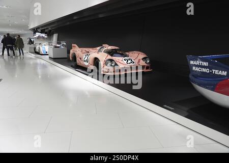 A pink Porsche 917 with a pig design on display in the museum, Neues Porschemuseum 2009, Stuttgart, Baden-Wuerttemberg, Germany, Europe Stock Photo