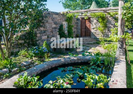 The Pazo's Secret Garden designed by Rose McMonigall at the RHS Hampton Court Palace Flower Show 2017. Stock Photo