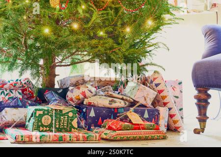 Christmas presents under the tree Stock Photo