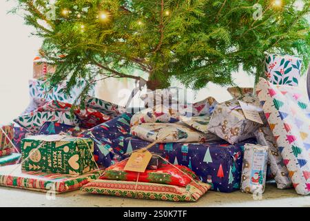 Christmas presents under the tree Stock Photo