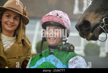 Isabel Williams celebrates with connections after winning the 12.05 on Tour Ovalie at Newbury Racecourse, Newbury Picture by Paul Blake/Alamy Sports News Stock Photo